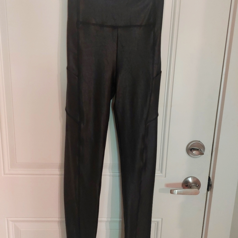 Black leather-like pants, size M.
